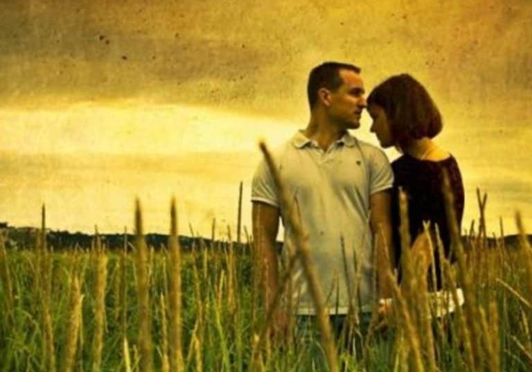 strong man field woman